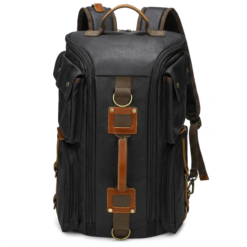 Antony - Sac à dos en toile cirée et cuir, ligne vintage, packshot sur fond blanc, coloris noir