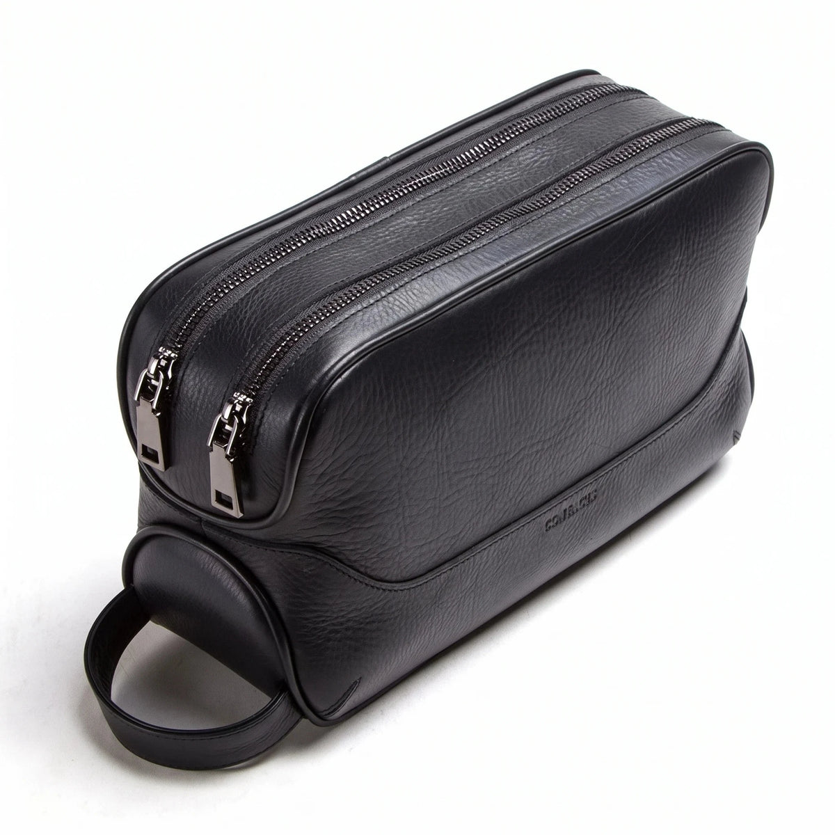 Savigny-sur-Orge - Trousse de toilette en cuir véritable, packshot sur fond blanc, coloris noir