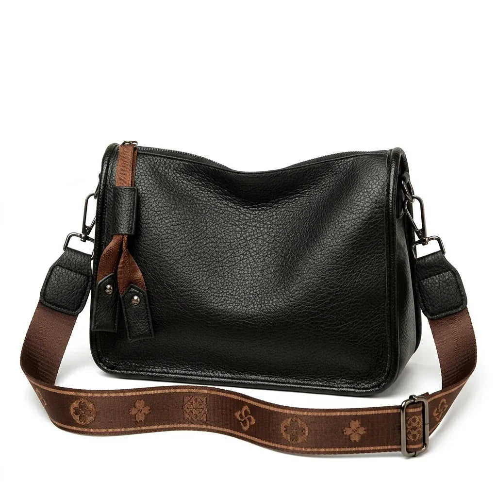 Strasbourg - sac bandoulière en cuir véritable - packshot sur fond blanc, coloris noir