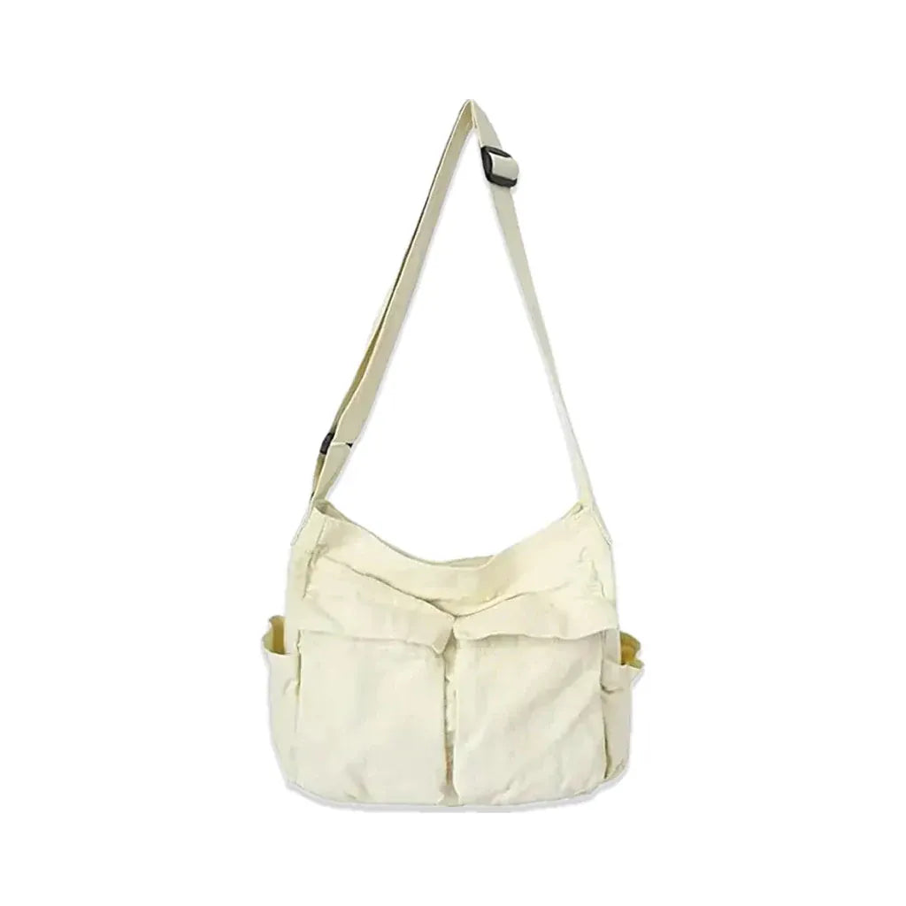 Caluire-et-Cuire - sac beige, vue de face sur fond blanc avec ombre douce
