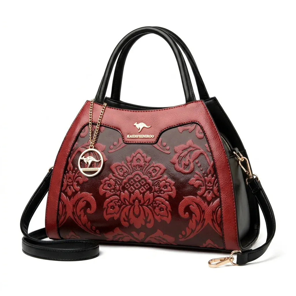 Corbeil-Essonnes - Sac à main simili cuir, format bowling - packshot sur fond blanc, coloris bordeaux à motif