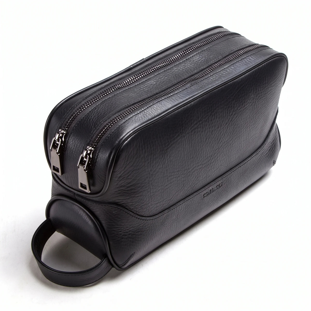 Savigny-sur-Orge - Trousse de toilette en cuir véritable, packshot sur fond blanc, coloris noir